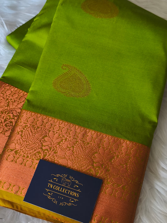 Kanchi Semi silk saree with contrast blouse and pallu.