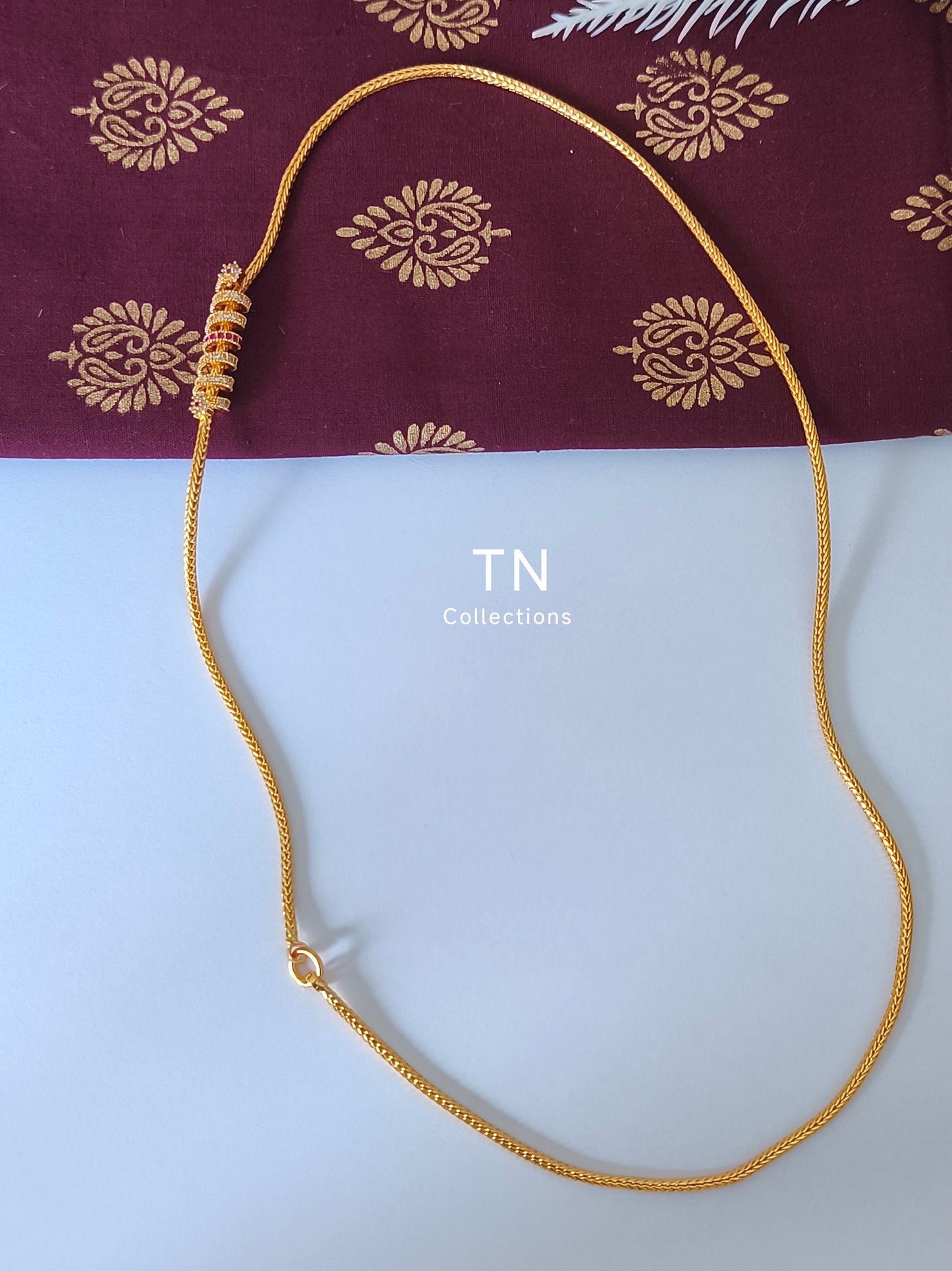 Micro gold plated Traditional Mugappu Kodi (White & Ruby stone)