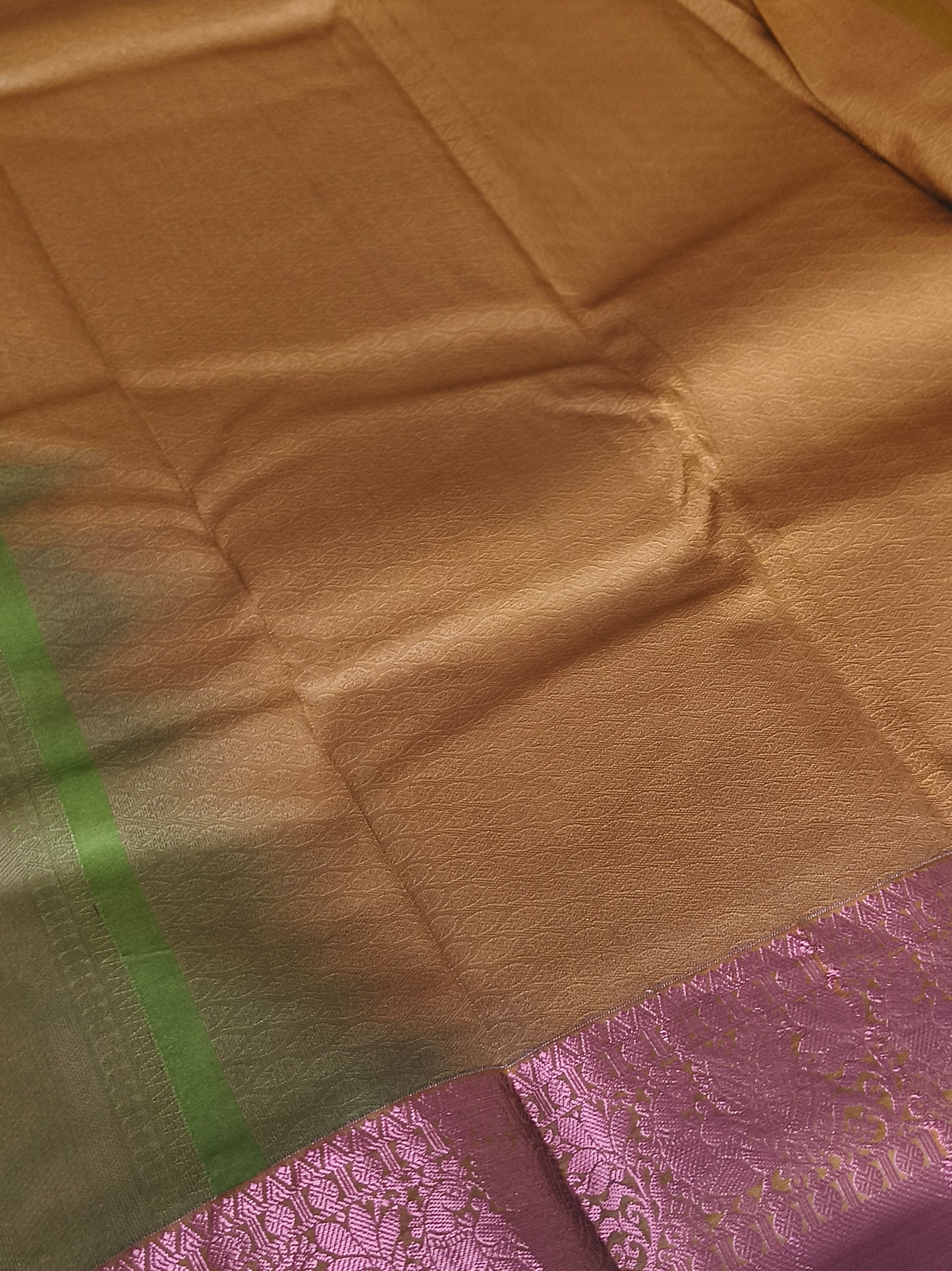 Kanchi Semi silk saree with contrast blouse and pallu.