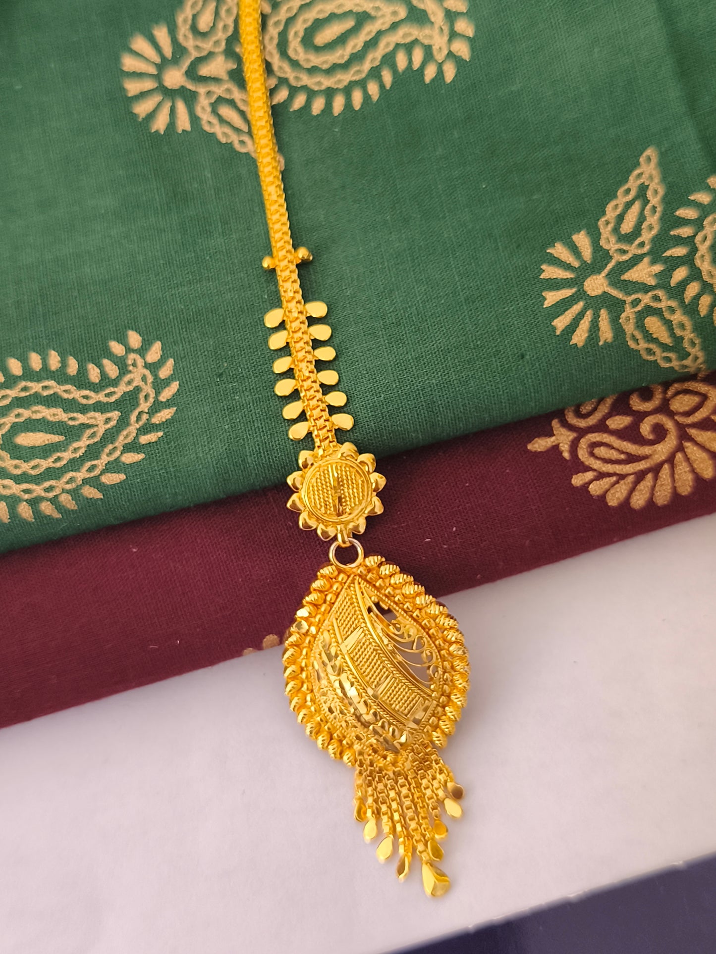 One gram gold forming Tikka