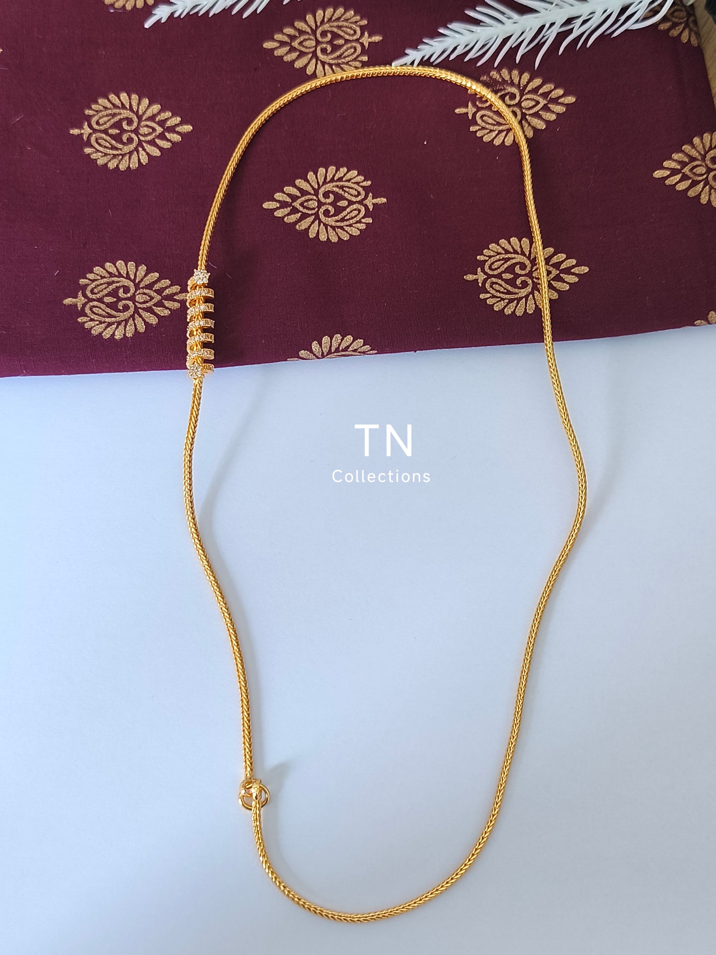 Micro gold plated Traditional Mugappu Kodi (White stone)
