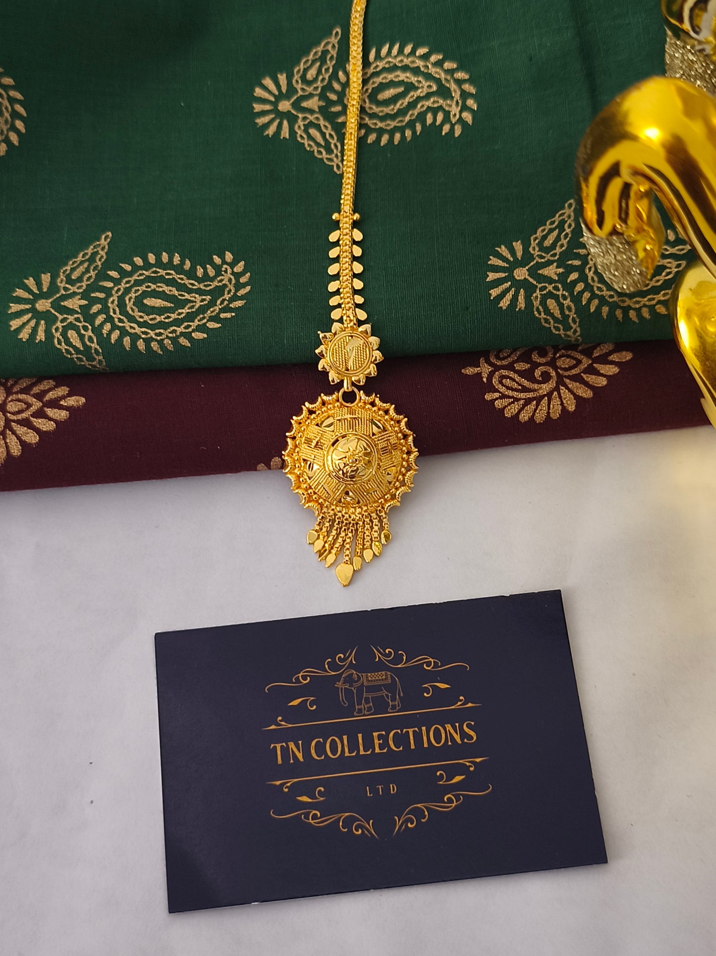 One gram gold forming Tikka