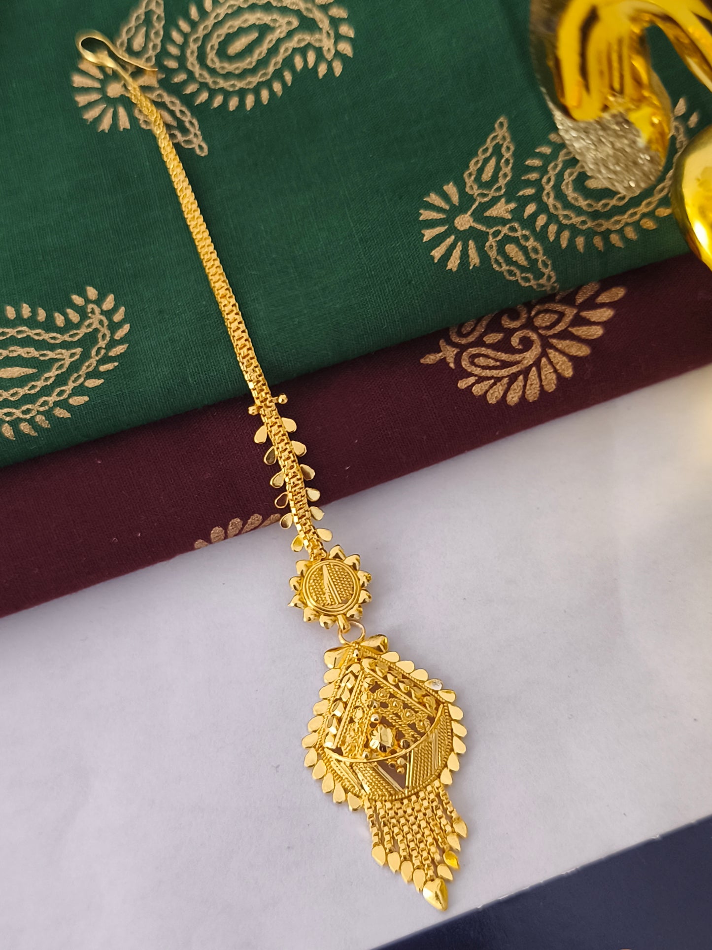 One gram gold forming Tikka