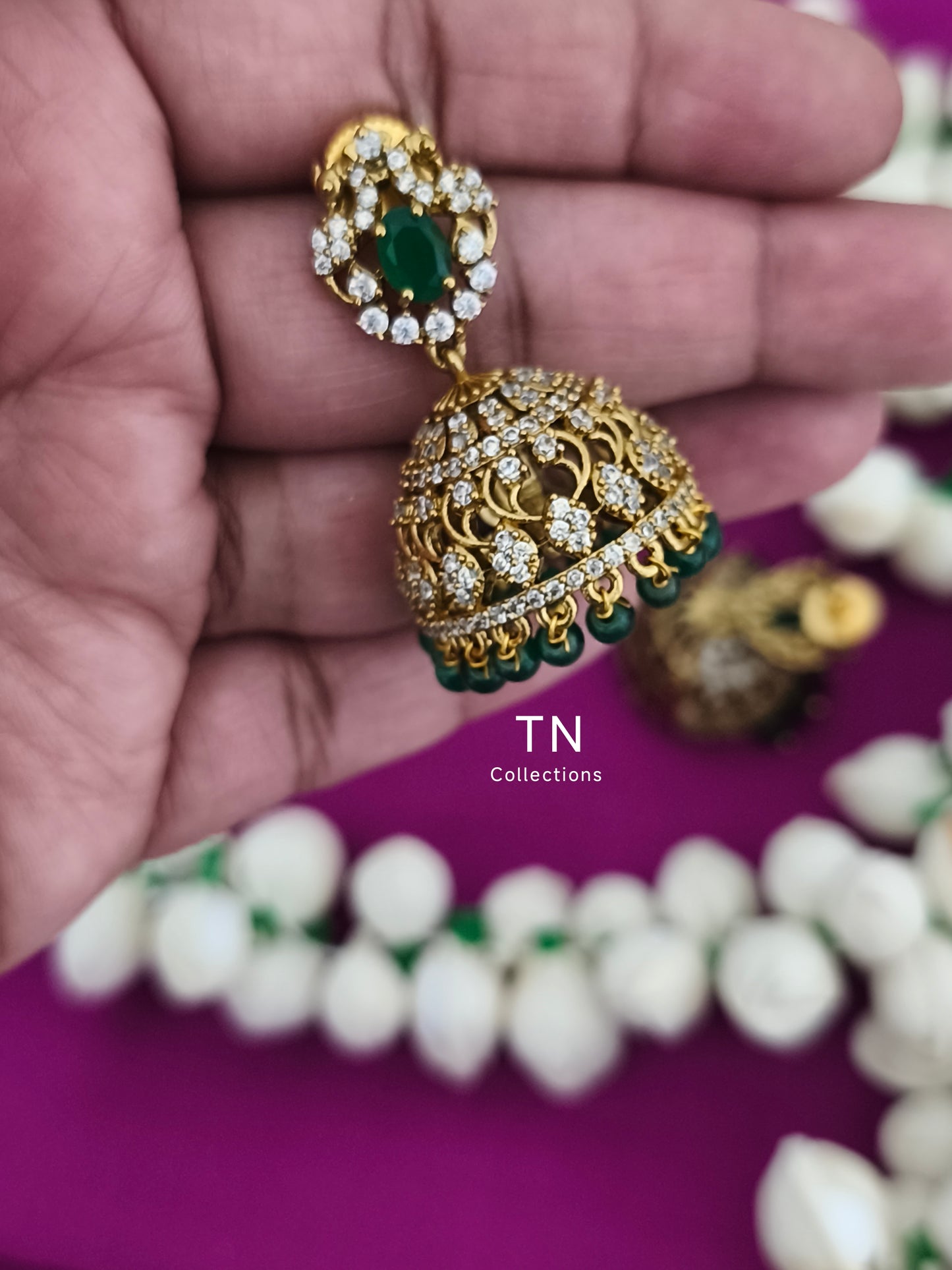 AD Antique Matte Finish Green Jhumka Earrings