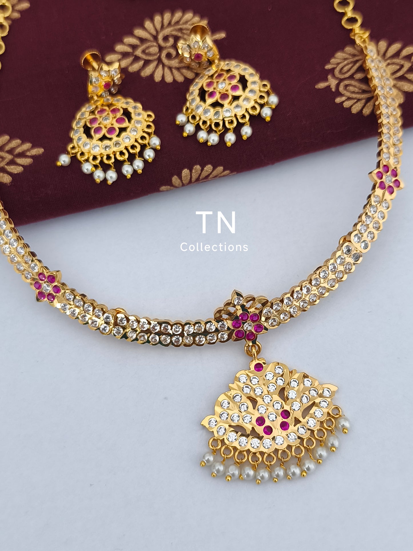 Traditional Gold finish Attiyal with earrings