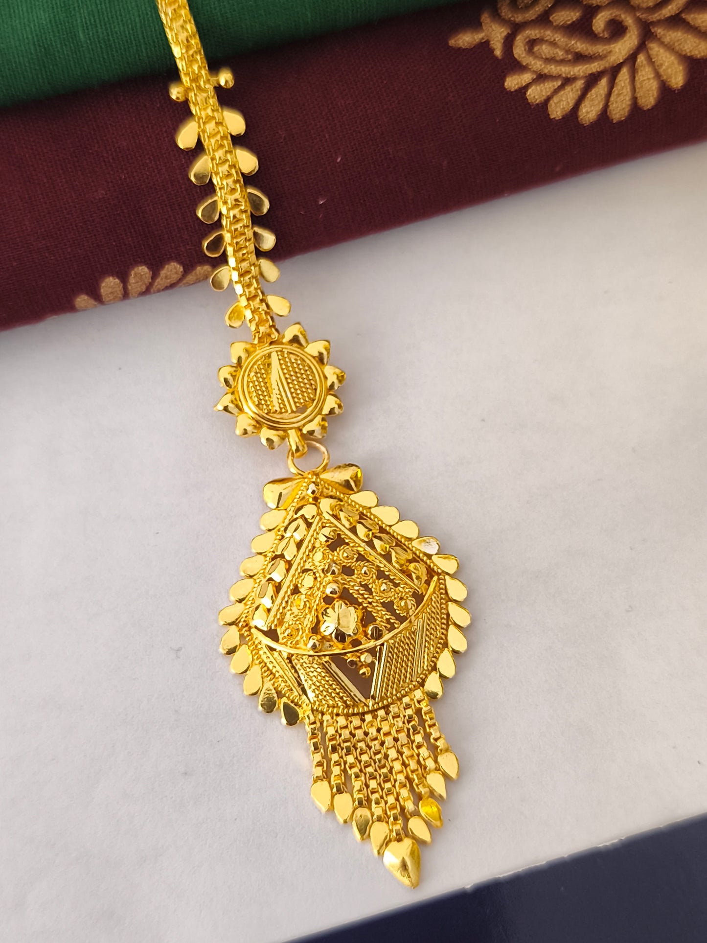 One gram gold forming Tikka
