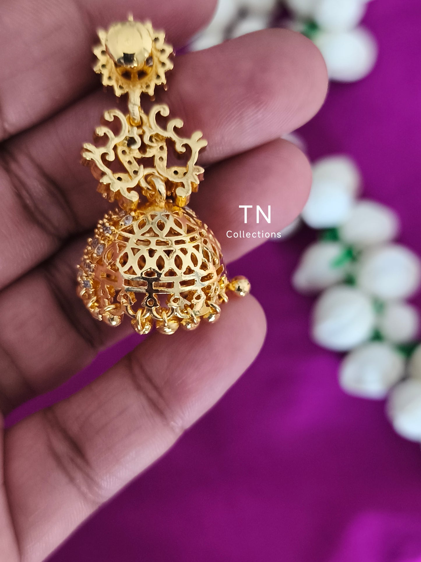 Gold Finish Peacock Design earrings Jhumka