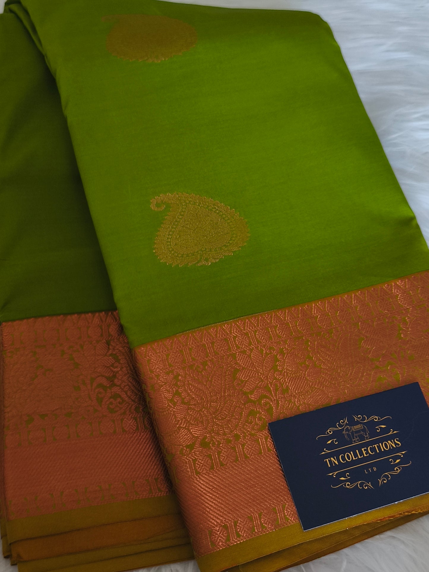 Kanchi Semi silk saree with contrast blouse and pallu.