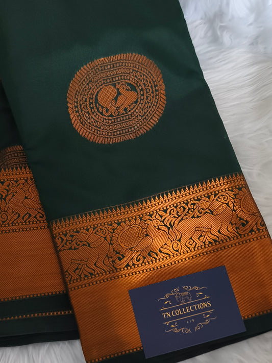 Dark Green Traditional Kanchi embossed Soft Silk saree