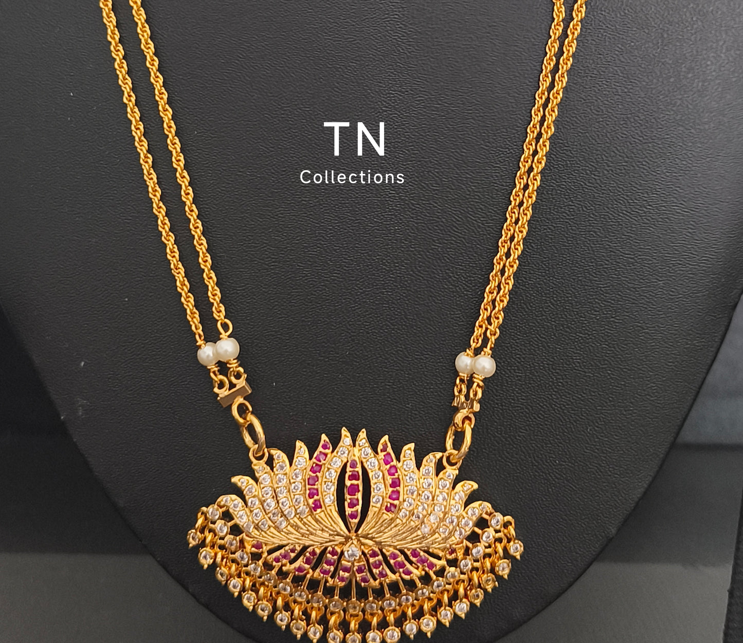 Impon Lotus Pathakkam with earrings