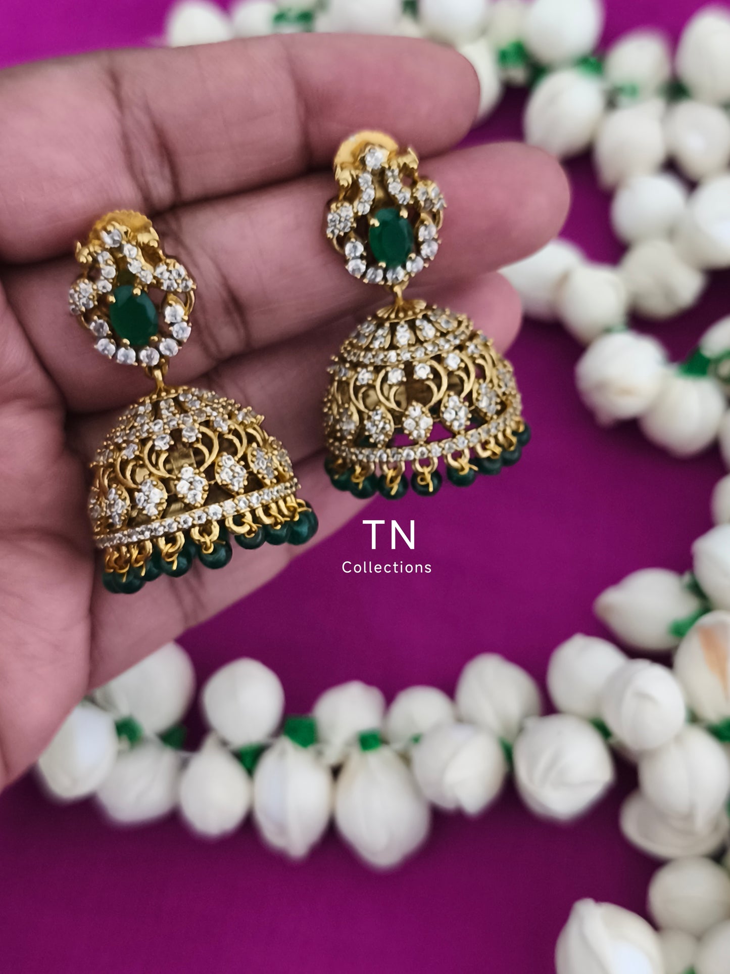 AD Antique Matte Finish Green Jhumka Earrings