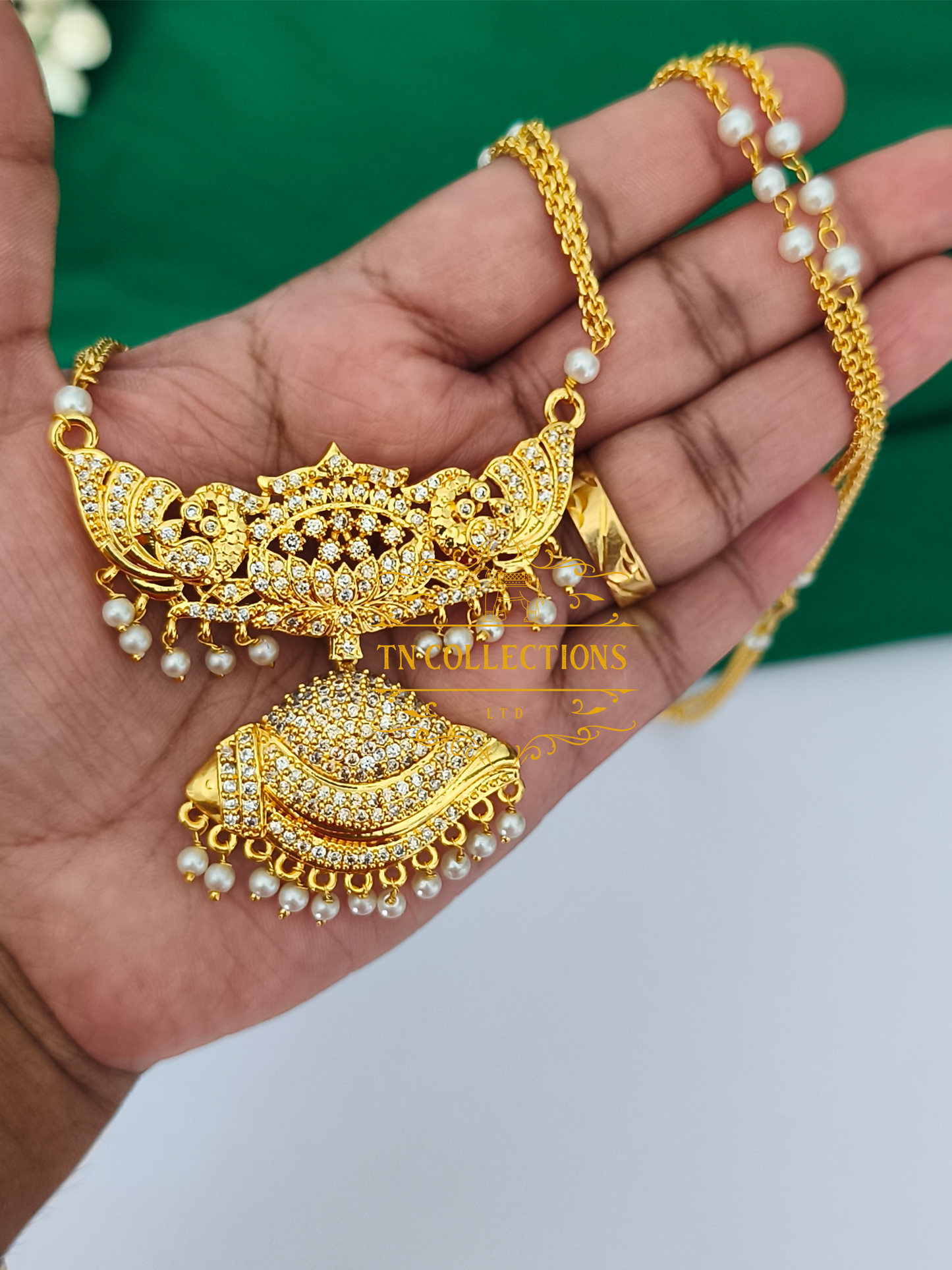 Micro Gold Finish Traditional Pathakkam with Pearl chain (Full White stones)