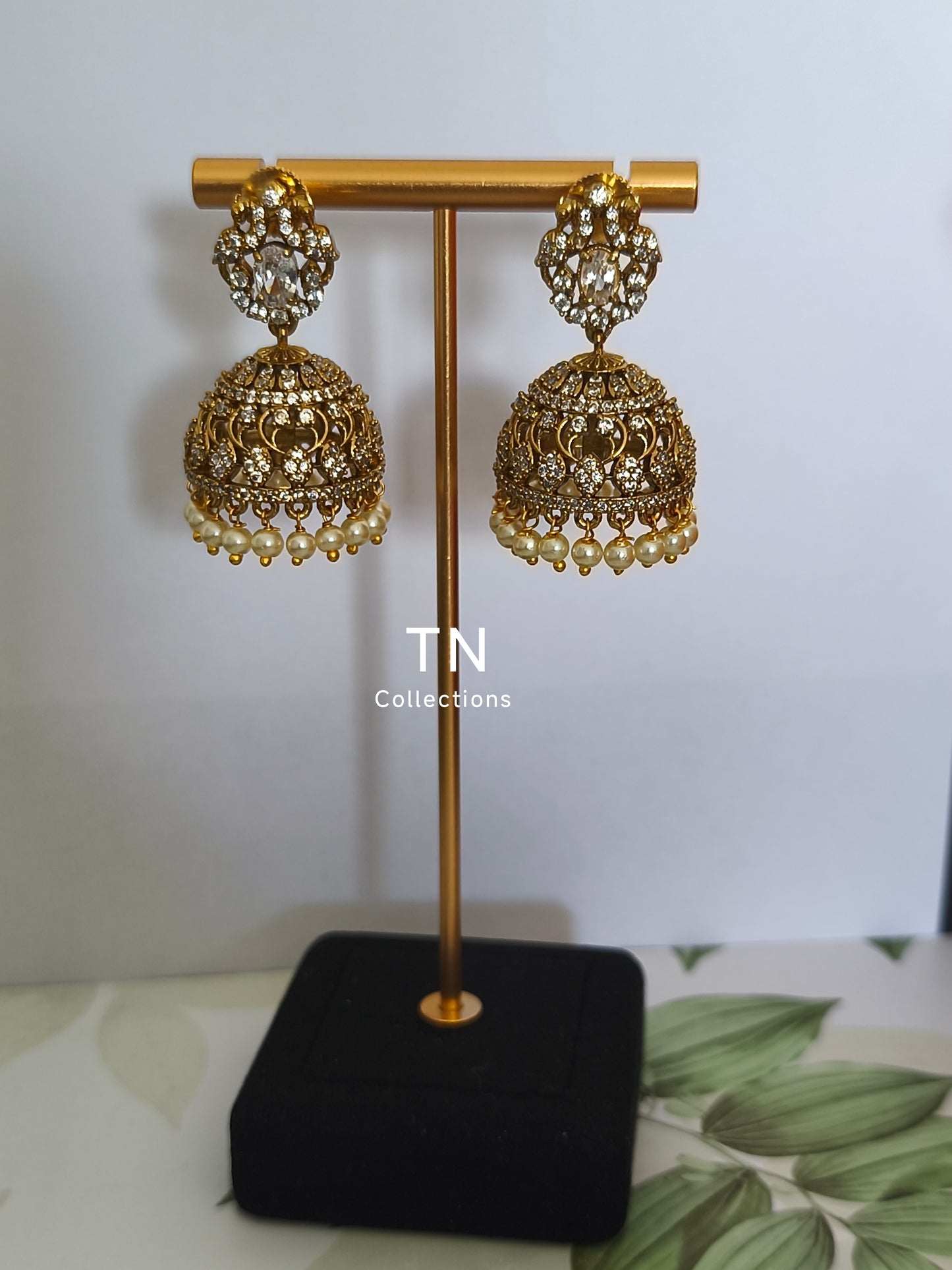 AD Antique Matte Finish Jhumka Earrings with pearls