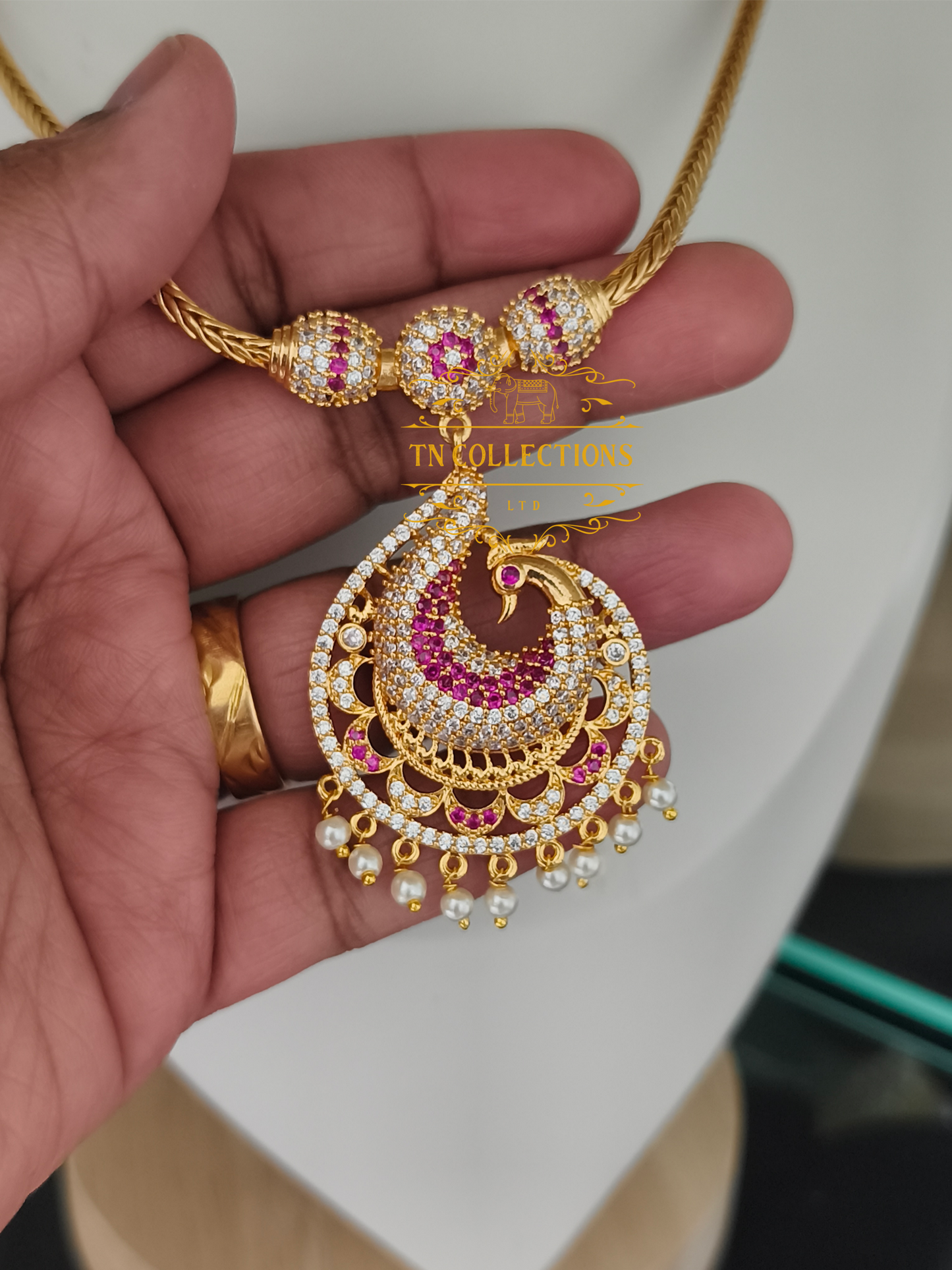 Micro Gold-Plated Traditional Peacock Attiyal (Ruby & white stones)