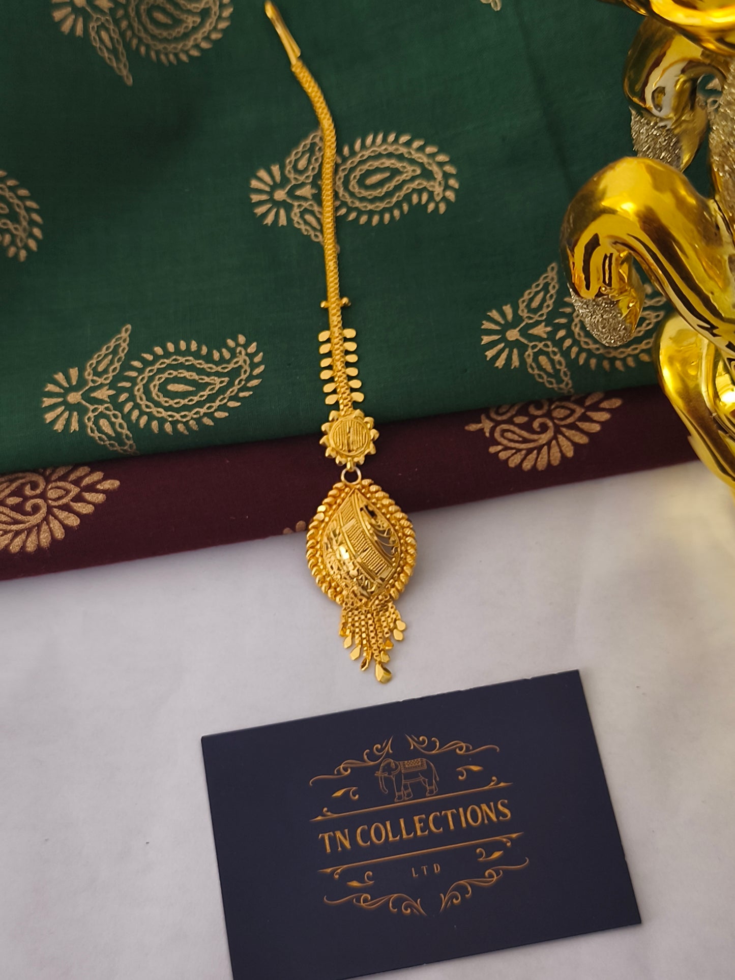 One gram gold forming Tikka