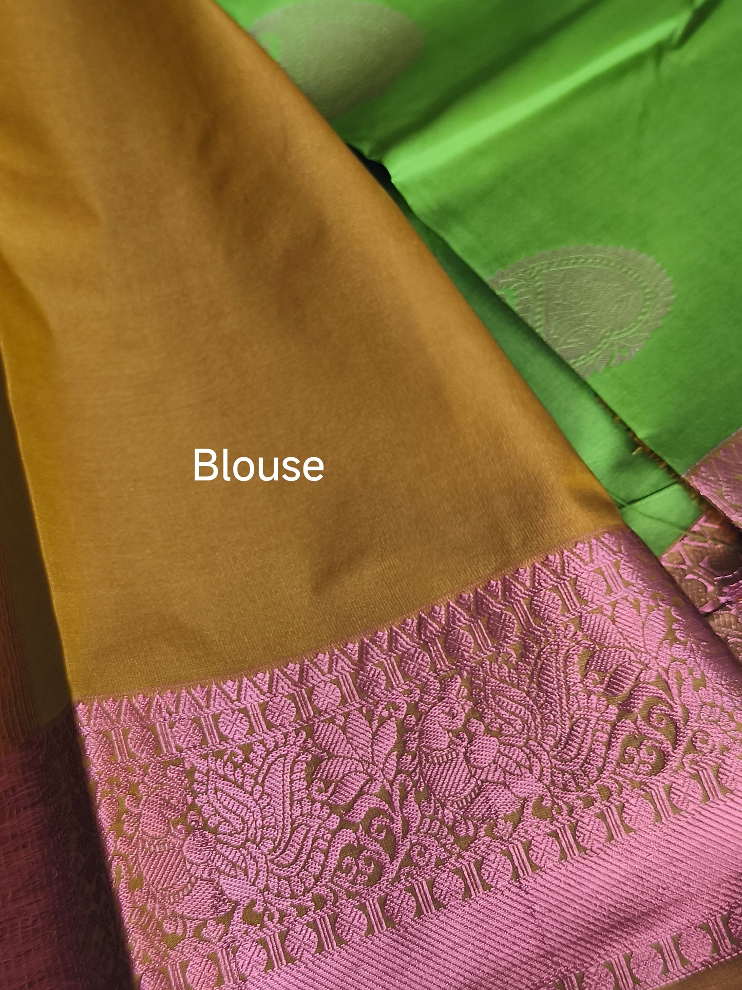Kanchi Semi silk saree with contrast blouse and pallu.