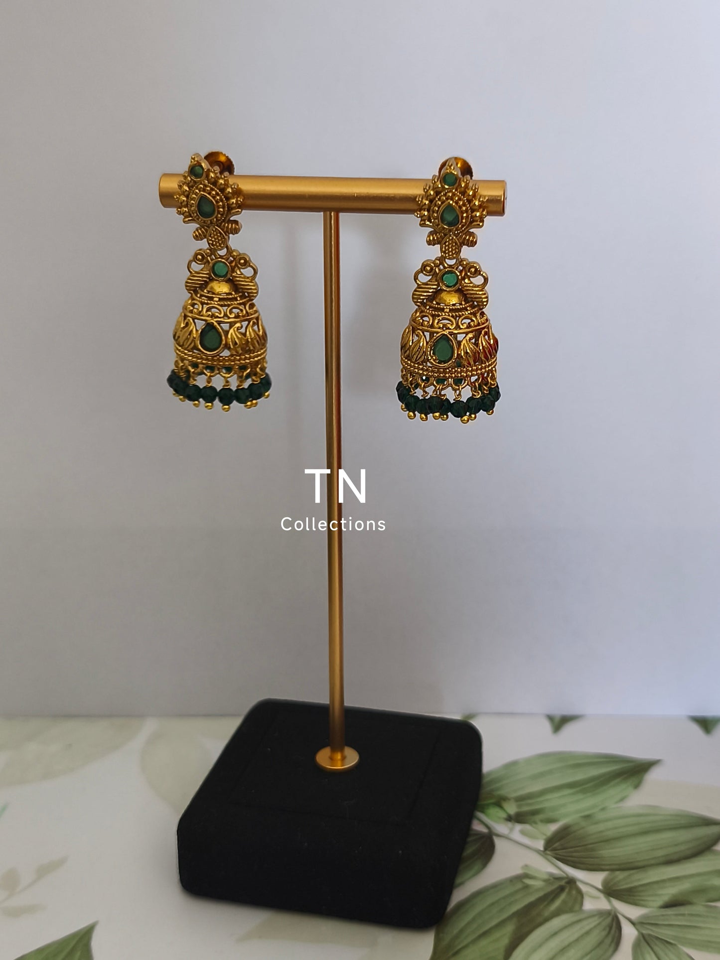 Matte Finish Earrings with green stone and pearls