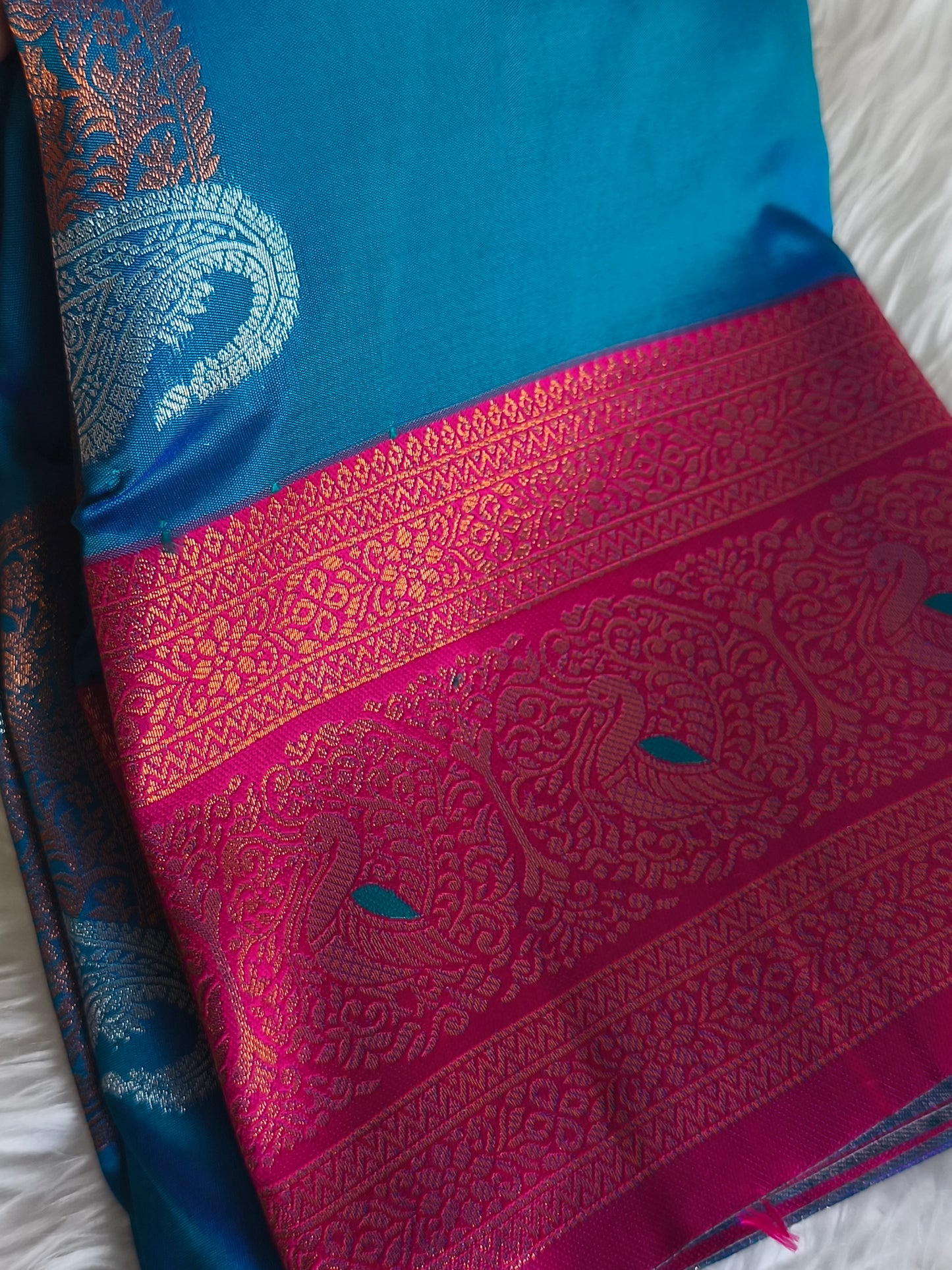 Peacock blue Kanchi Soft Silk Saree with contrast blouse and rich pallu