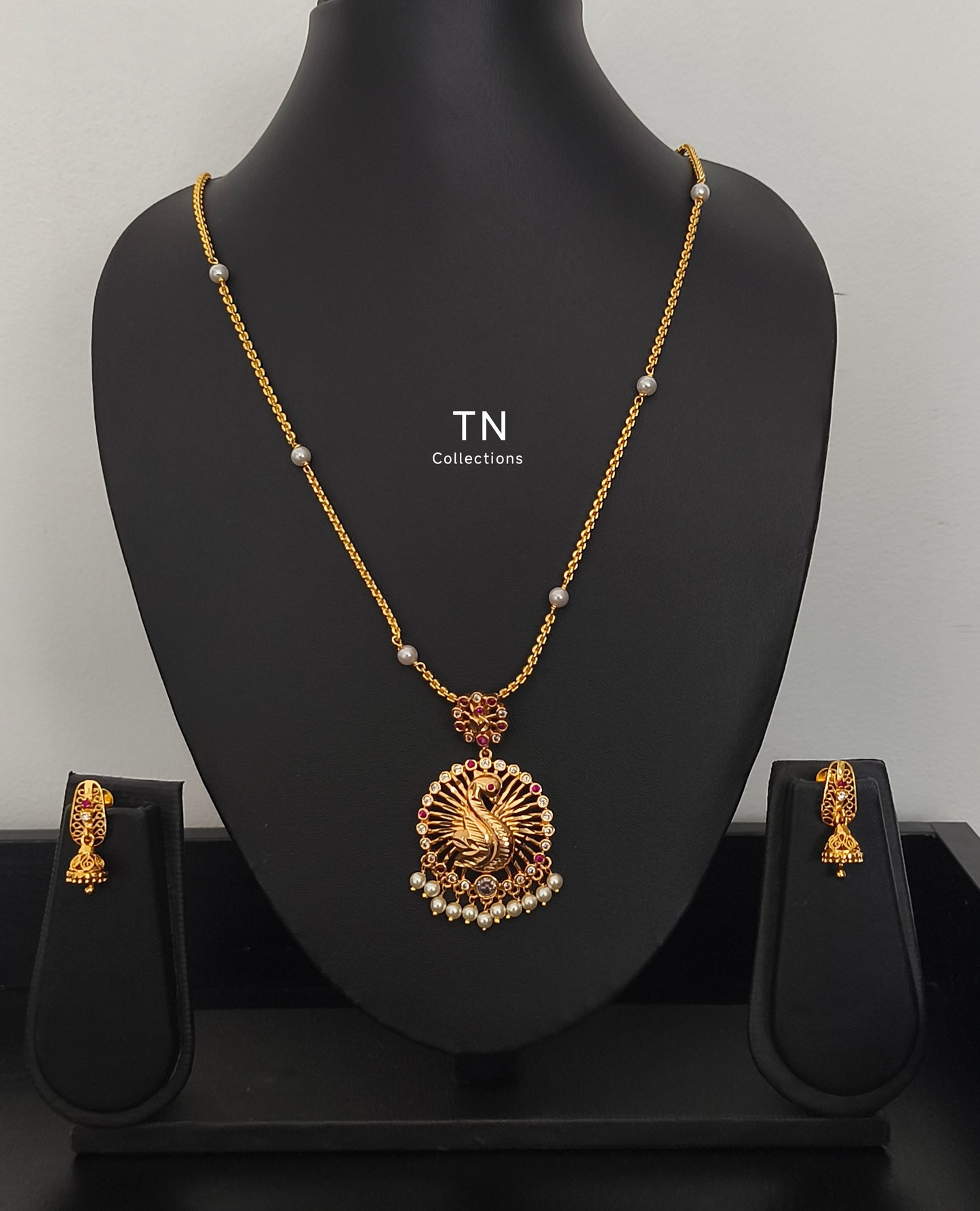 Micro gold plated Pearl chain with Peacock Design Pendant