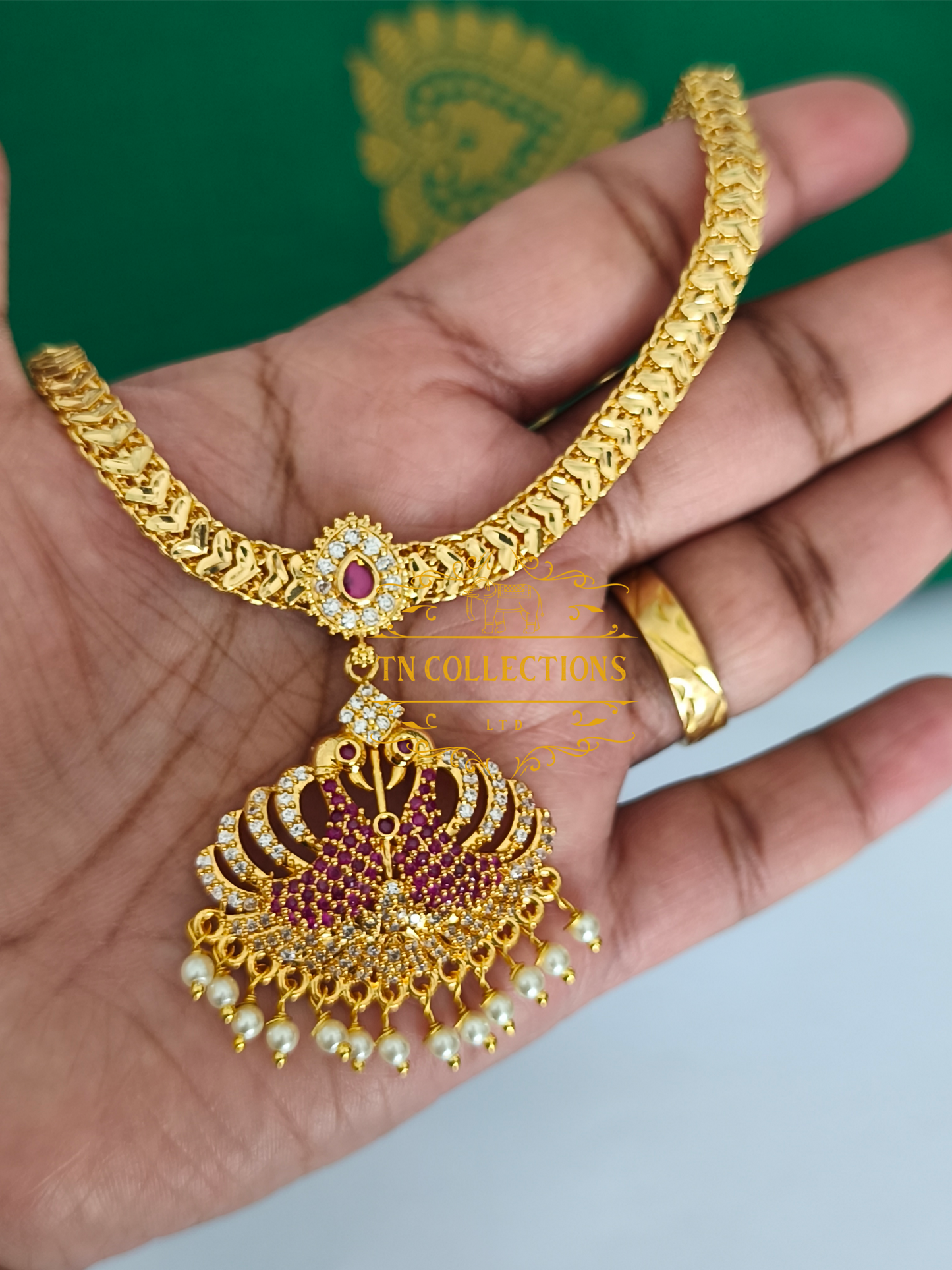 Micro Gold-Plated Peacock Attiyal (Ruby and white stones)