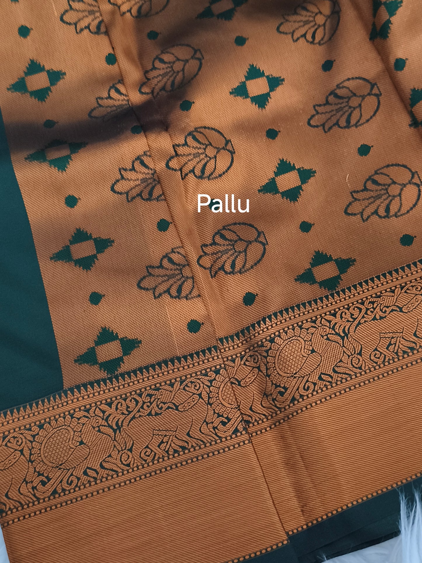 Dark Green Traditional Kanchi embossed Soft Silk saree