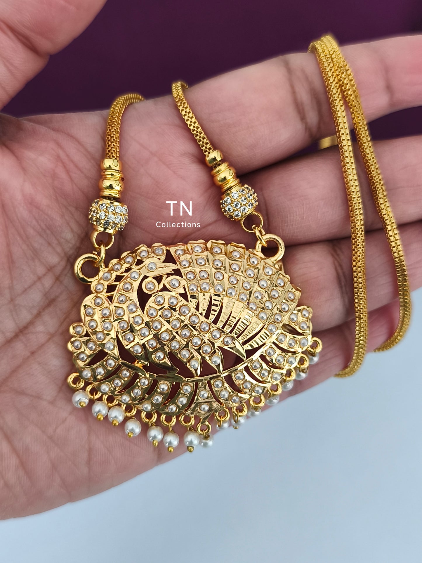 Micro gold plated Peacock Design Pathakkam with chain ( White Pearls & Stones)