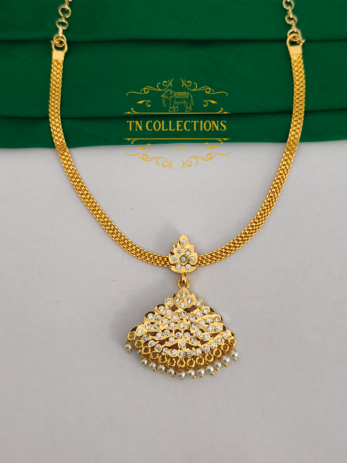 Traditional Impon Micro gold plated Attiyal (Full white Stones)