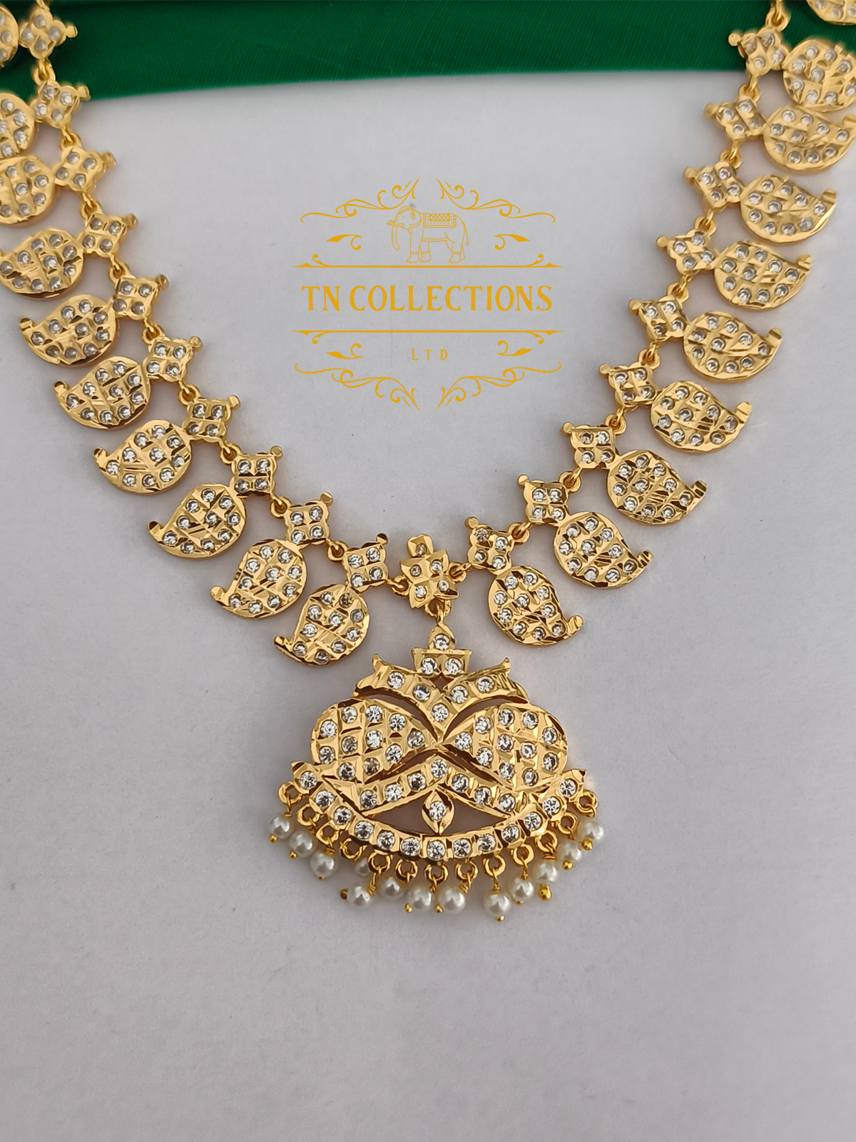 Micro Gold Finish Impon Mango Attiyal (Full White Stones)