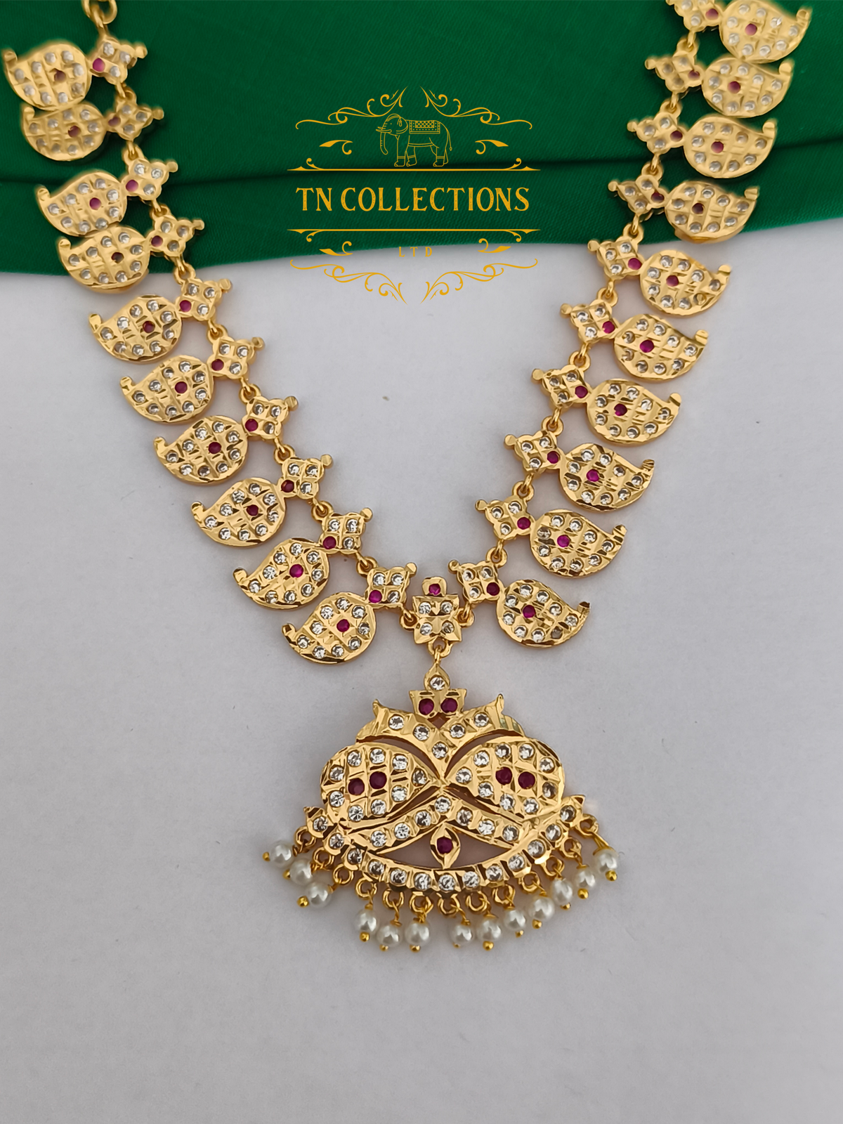 Micro Gold Finish Impon Mango Attiyal (Ruby & White Stones)