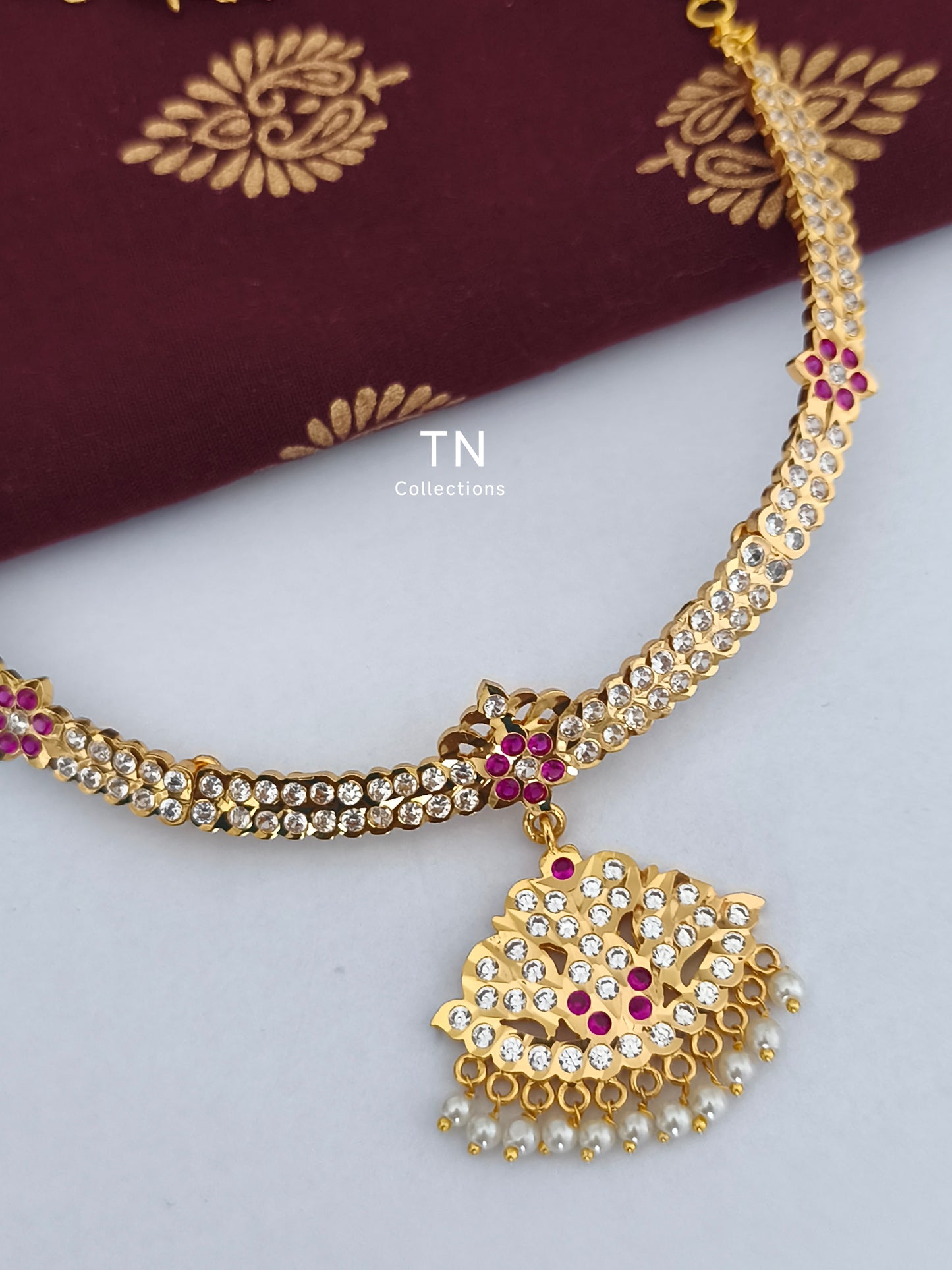 Traditional Gold finish Attiyal with earrings