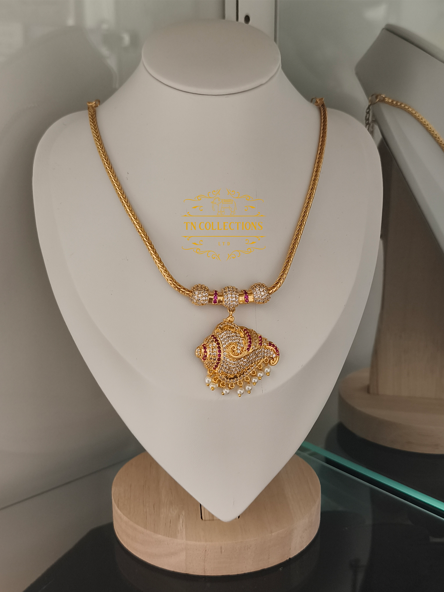 Micro Gold-Plated Traditional Sangu Attiyal (Ruby & white stones)