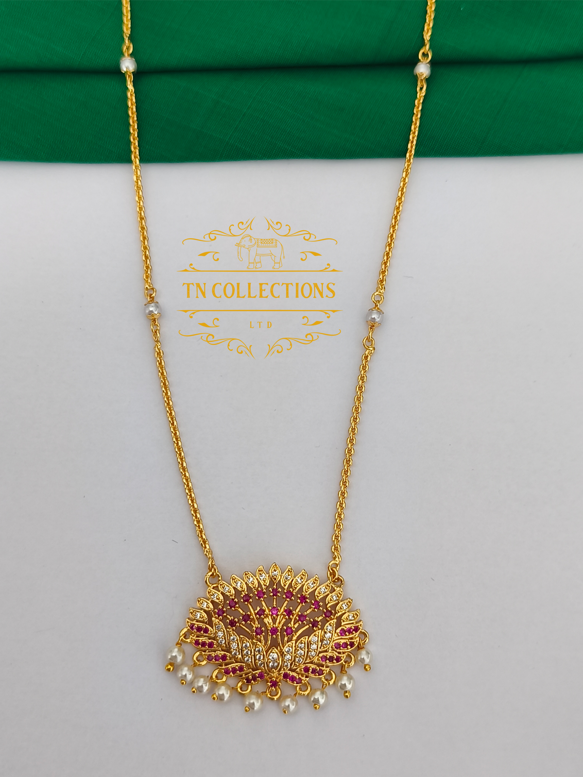 Micro Gold-Plated Floral design Pendant with Pearl chain (Ruby and white stones)