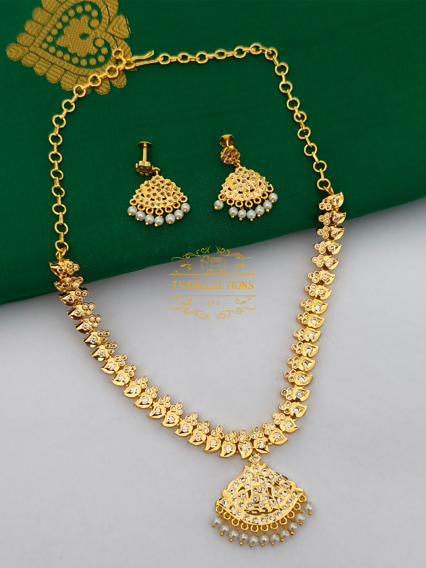 Micro Gold Plated Traditional Attiyal with earrings (Full White stones)