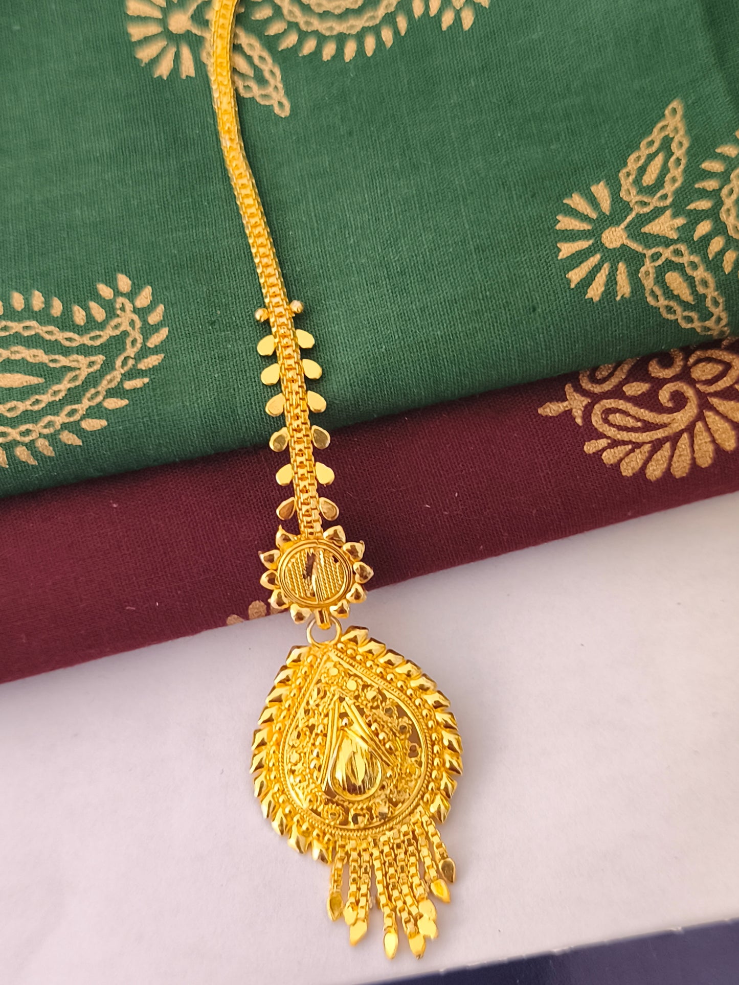 One gram gold forming Tikka