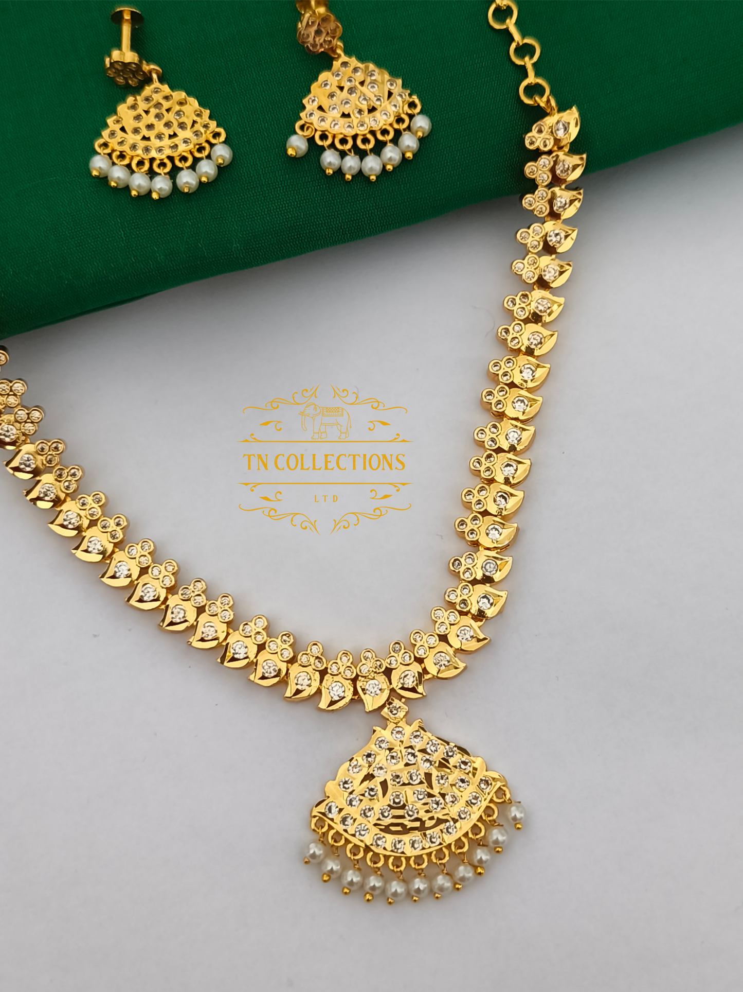 Micro Gold Plated Traditional Attiyal with earrings (Full White stones)