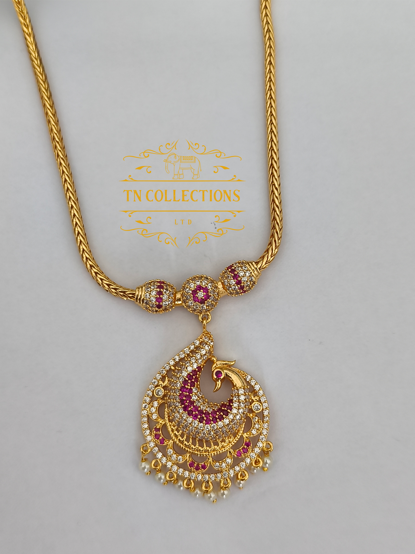 Micro Gold-Plated Traditional Peacock Attiyal (Ruby & white stones)