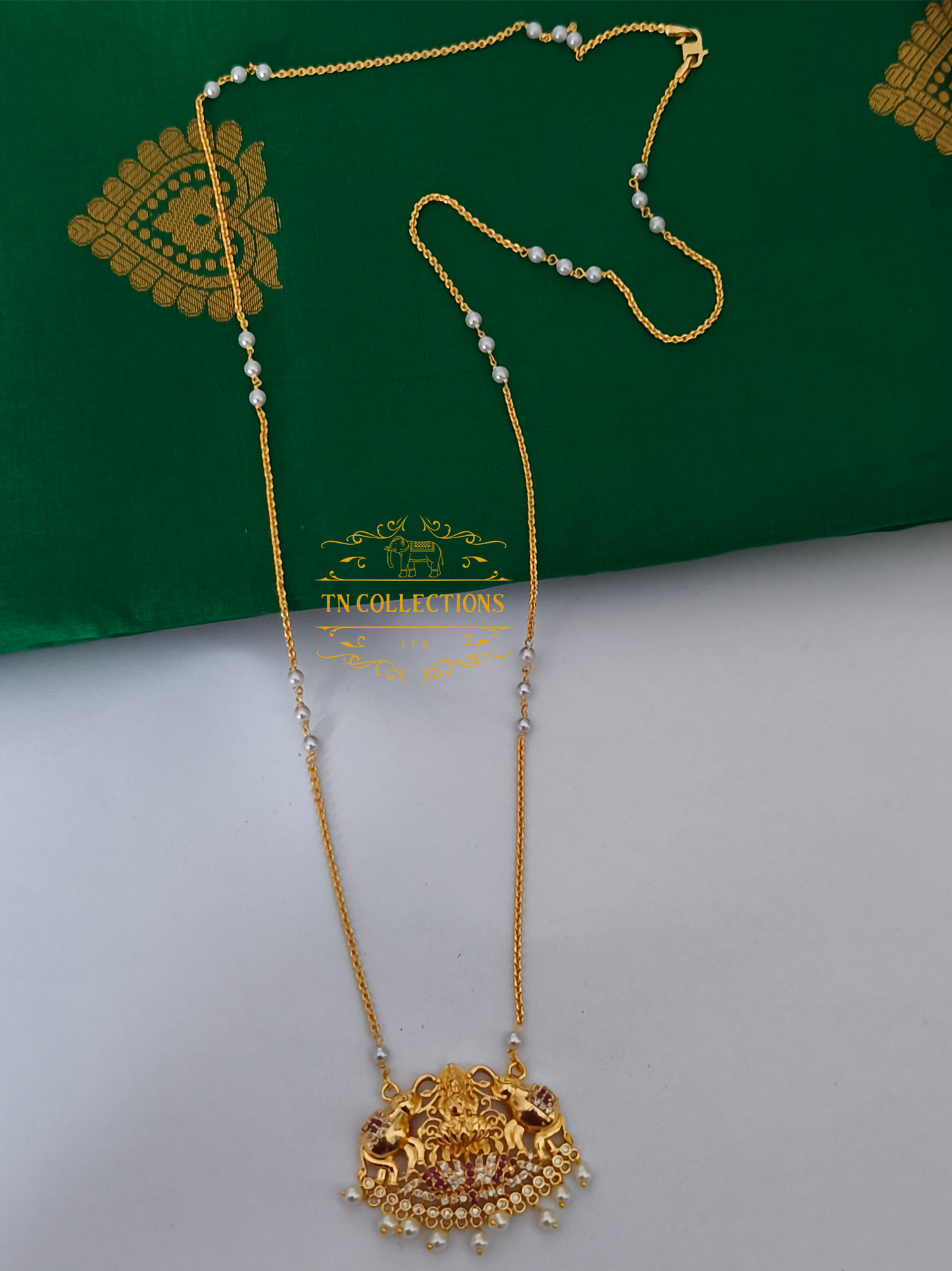Micro Gold-Plated Lakshmi Pathakkam with single layer pearl chain (Ruby & White stones)