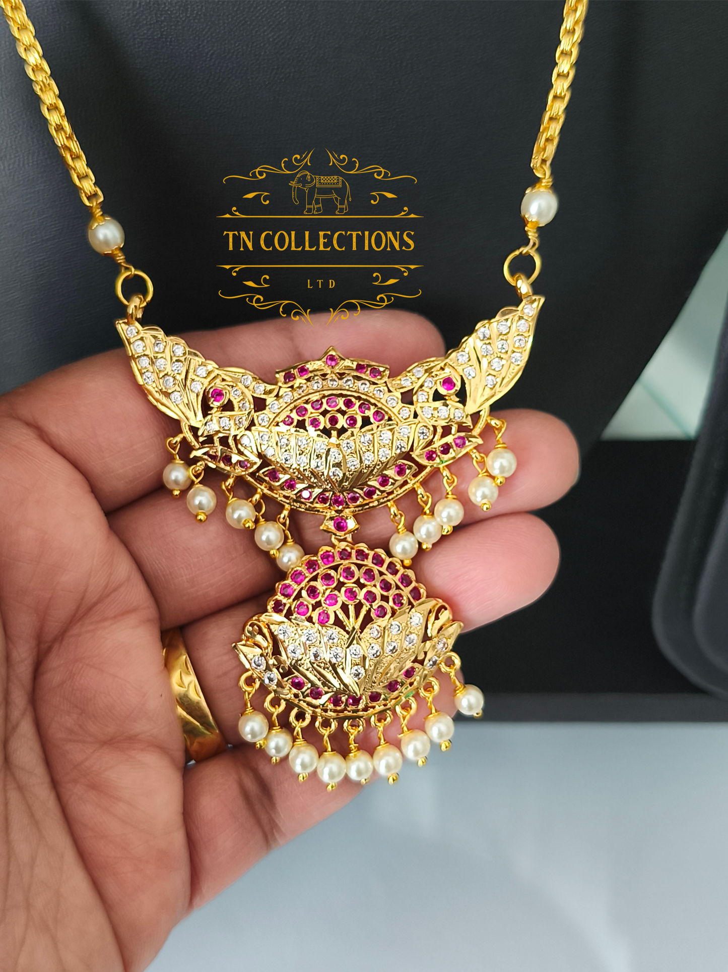 Micro Gold-Plated Traditional Alli Pathakkam with single layer pearl chain (Ruby & White stones)