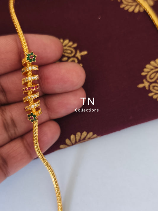 Micro gold plated Traditional Mugappu Kodi (White, Ruby & Green stone)