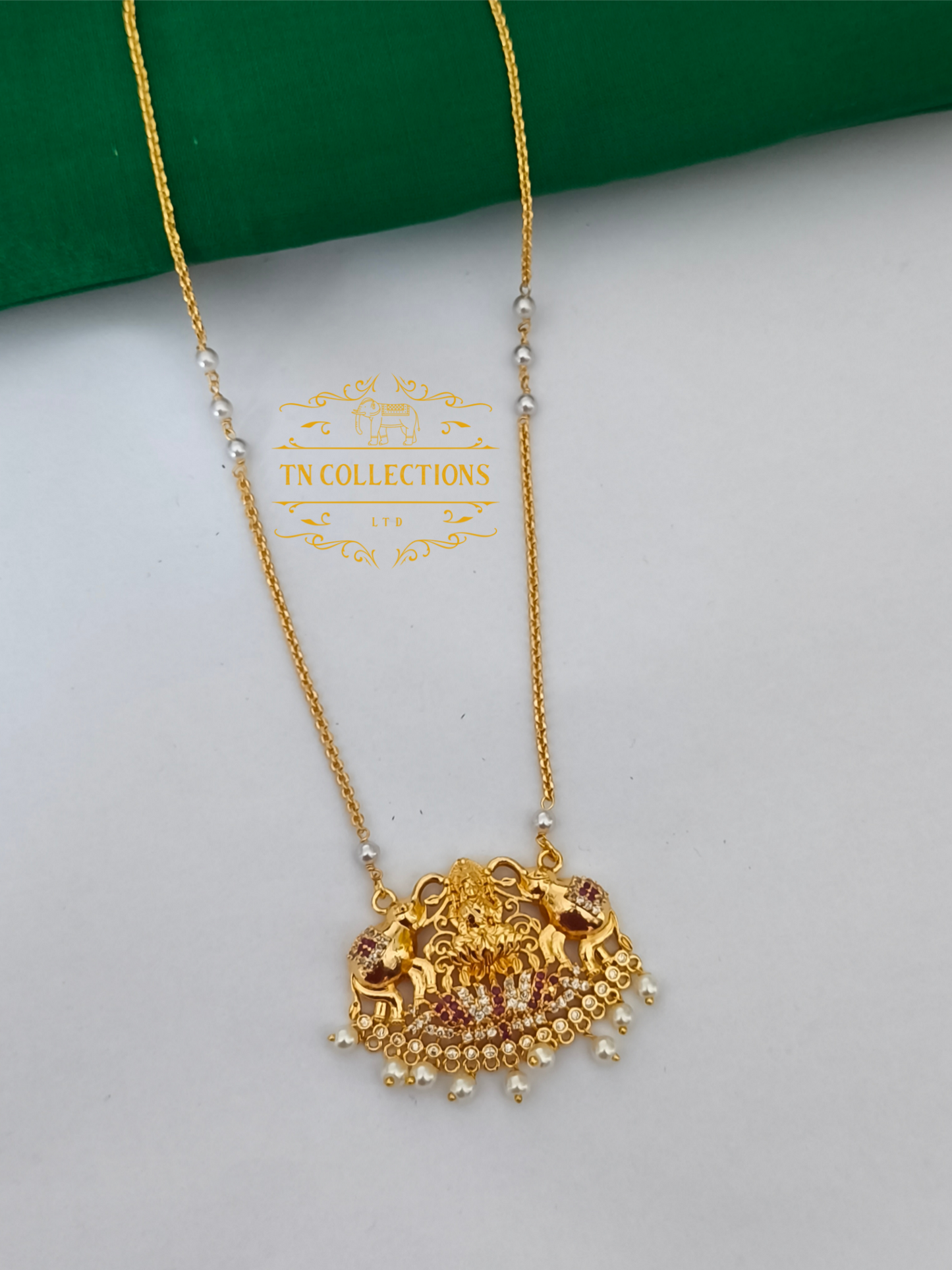 Micro Gold-Plated Lakshmi Pathakkam with single layer pearl chain (Ruby & White stones)