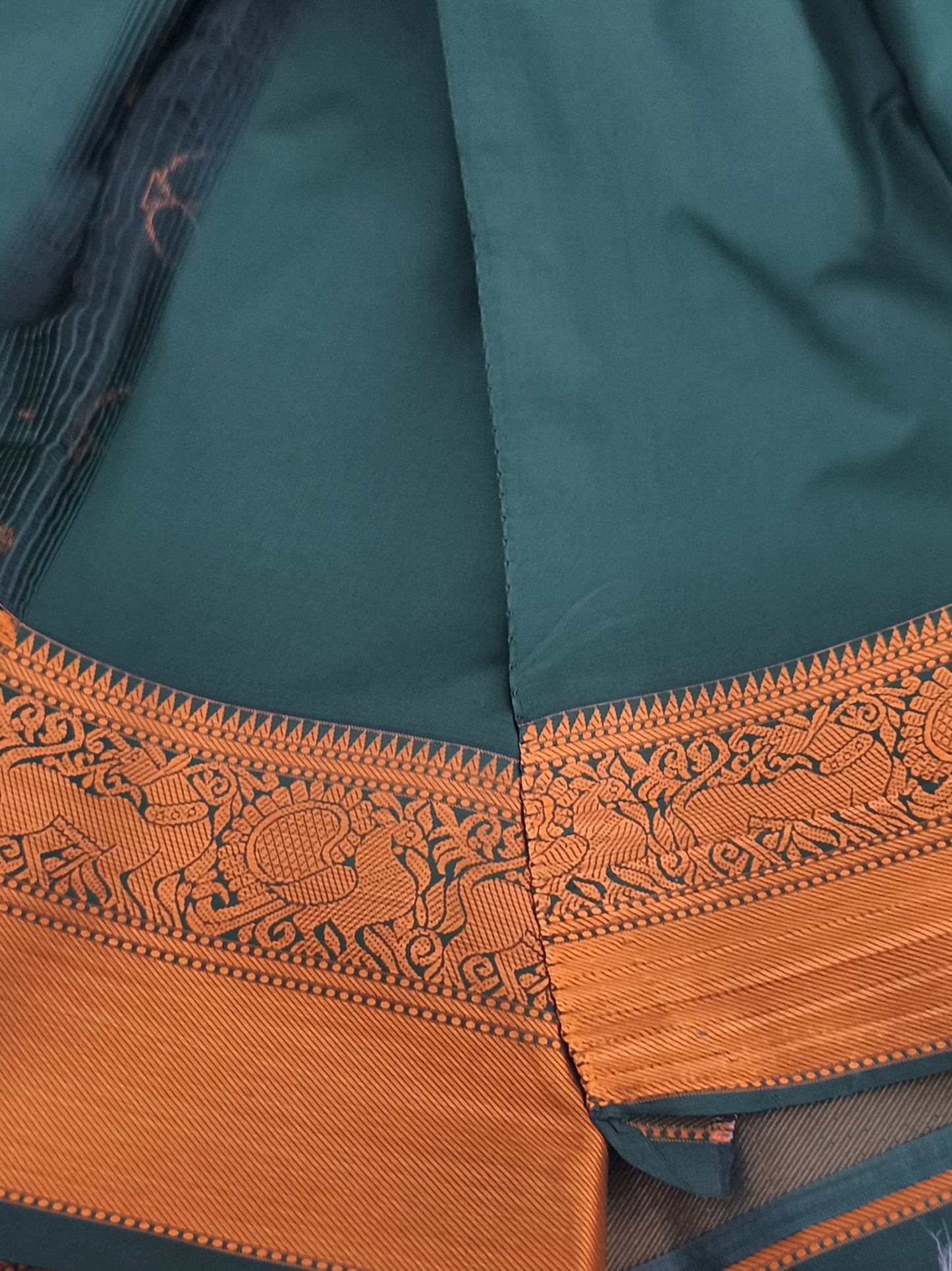 Dark Green Traditional Kanchi embossed Soft Silk saree