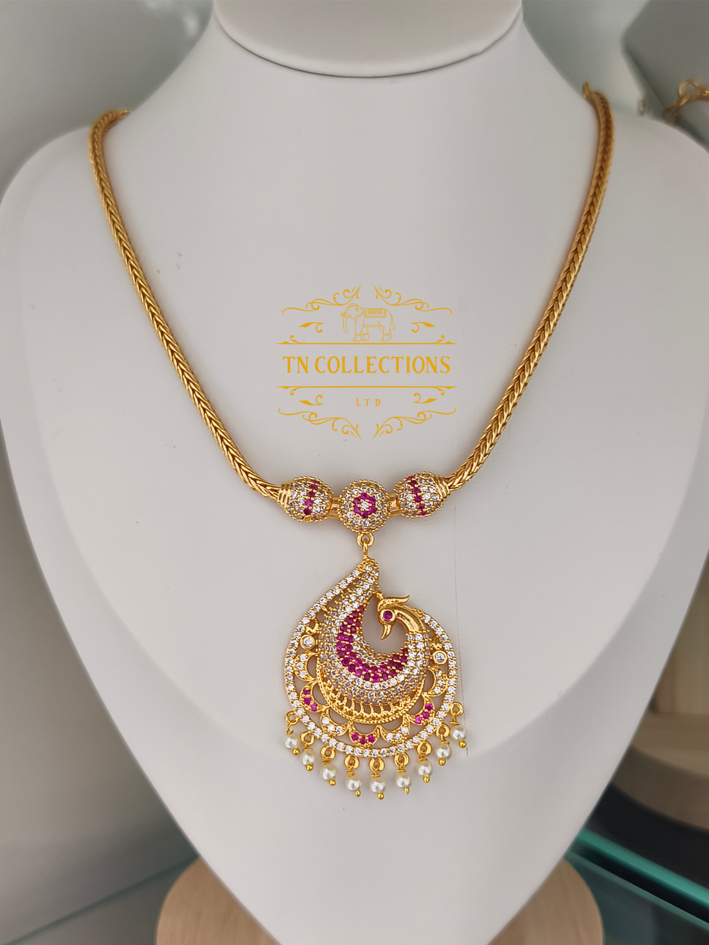 Micro Gold-Plated Traditional Peacock Attiyal (Ruby & white stones)