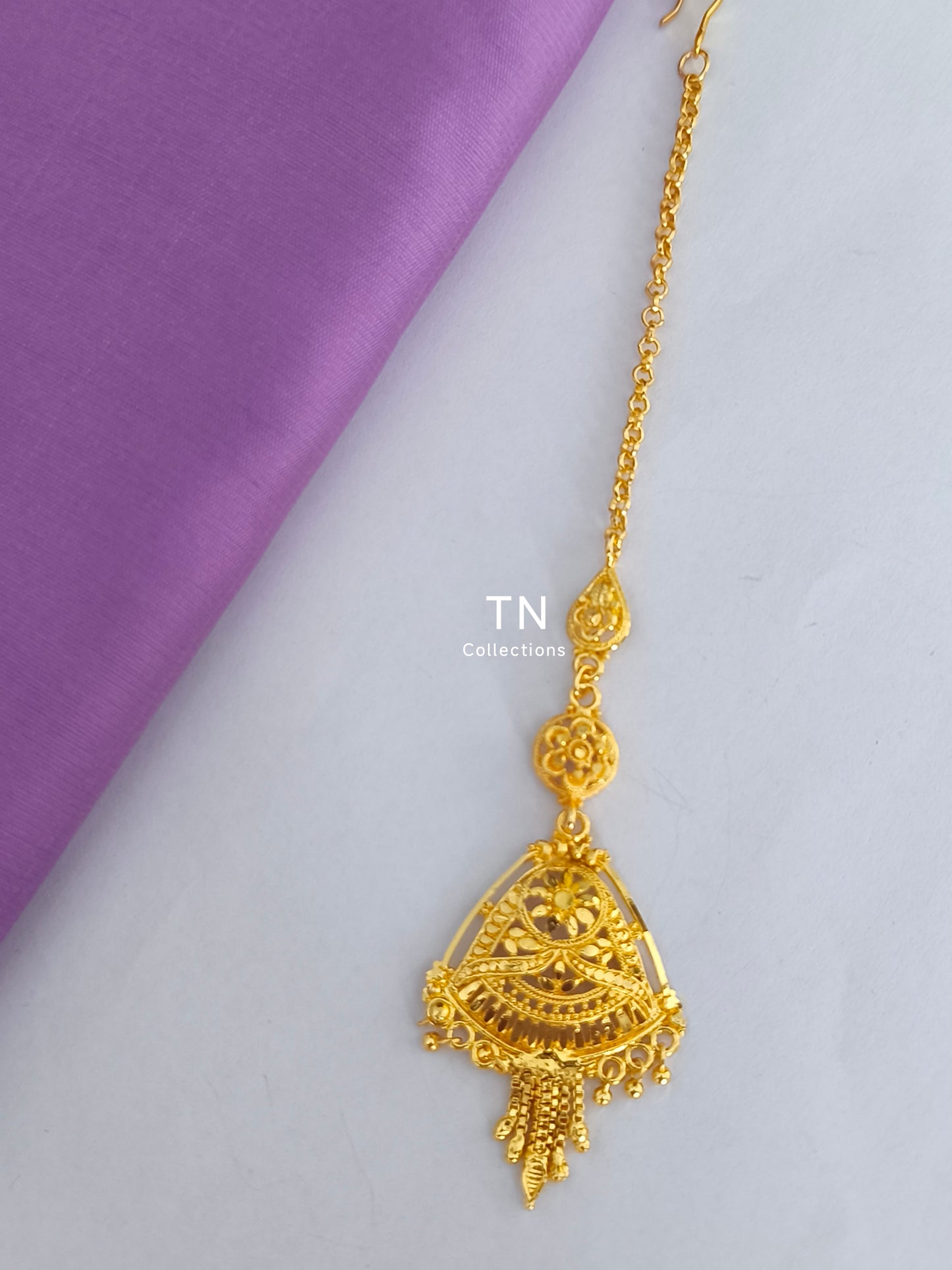 Gold plated tikka