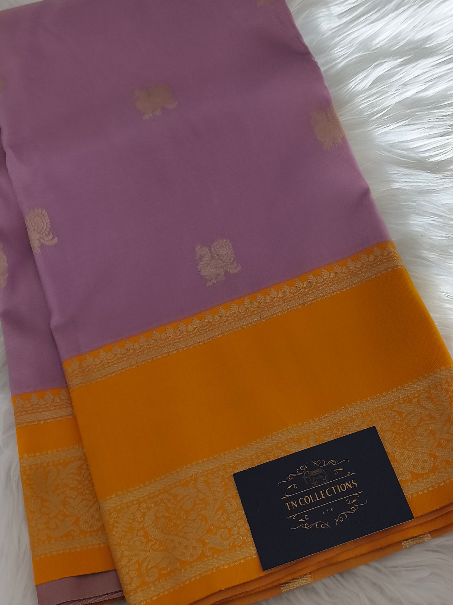 Stunning Kanchi Semi silk saree with contrast blouse