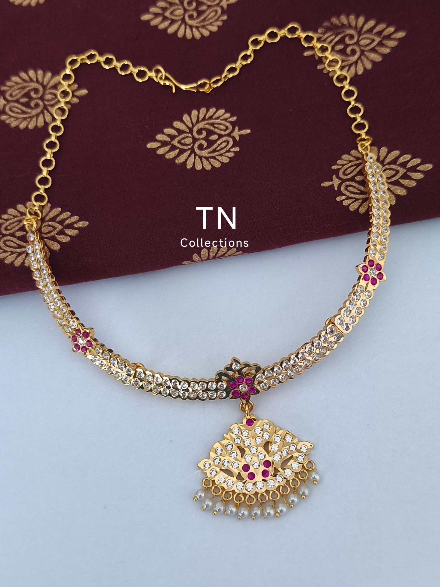 Traditional Gold finish Attiyal with earrings