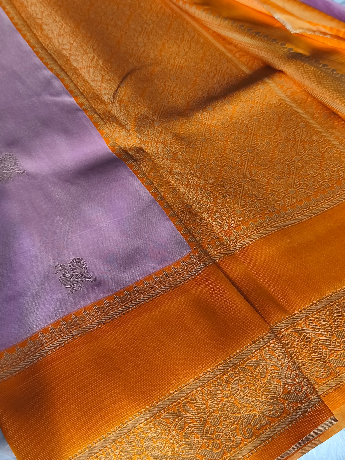 Stunning Kanchi Semi silk saree with contrast blouse