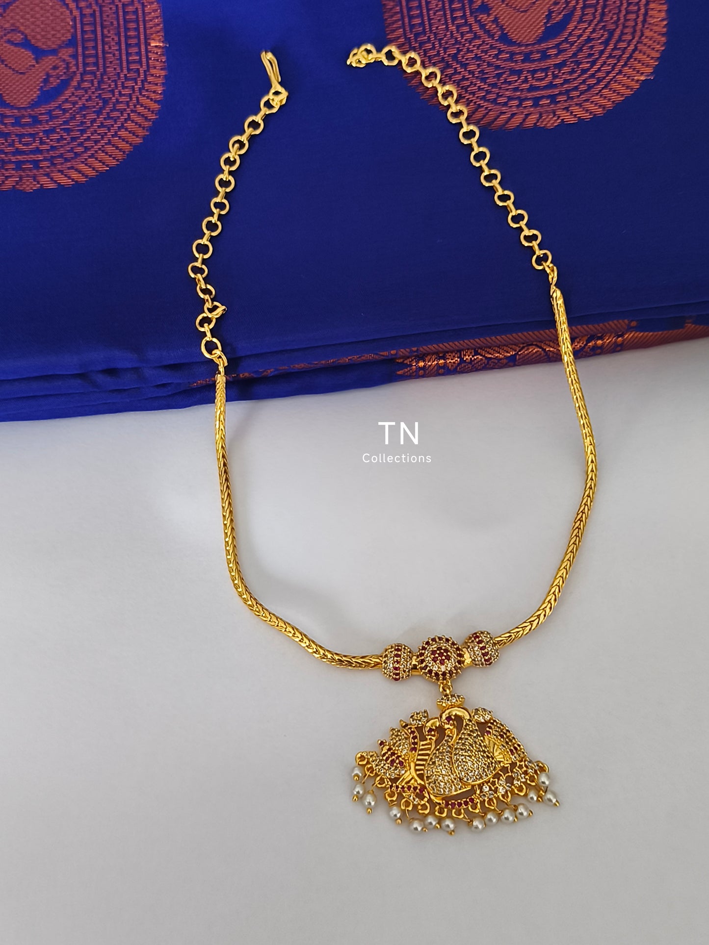 Micro gold plated peacock design Attiyal