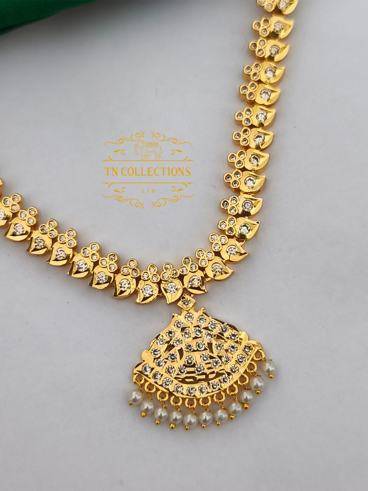 Micro Gold Plated Traditional Attiyal with earrings (Full White stones)