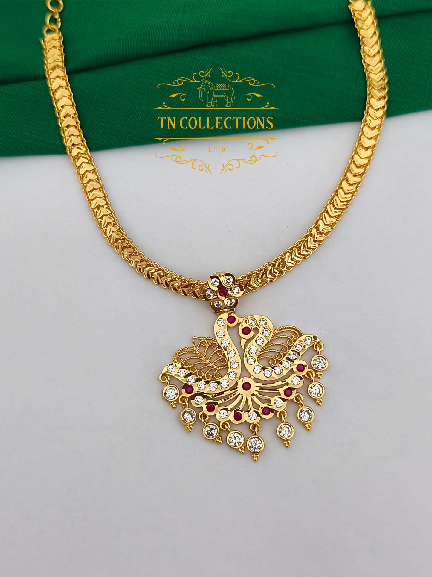 Gold polish impon Attiyal (Ruby & white stones)