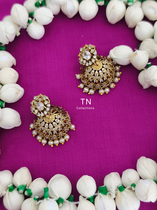 AD Antique Matte Finish Jhumka Earrings with pearls
